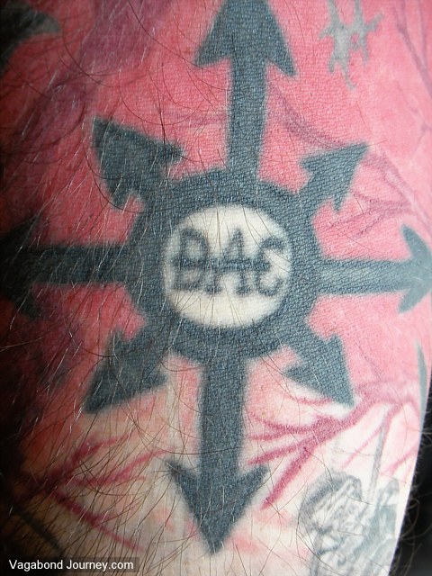 Punk rock tattoo from the younger days of roving without a penny.