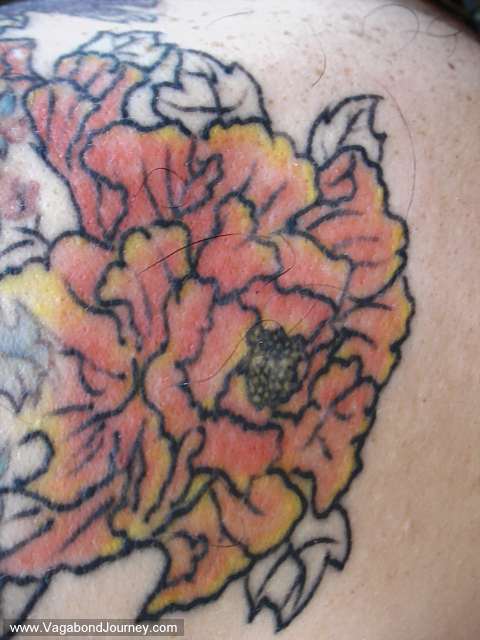 Peony flower tattoo done in