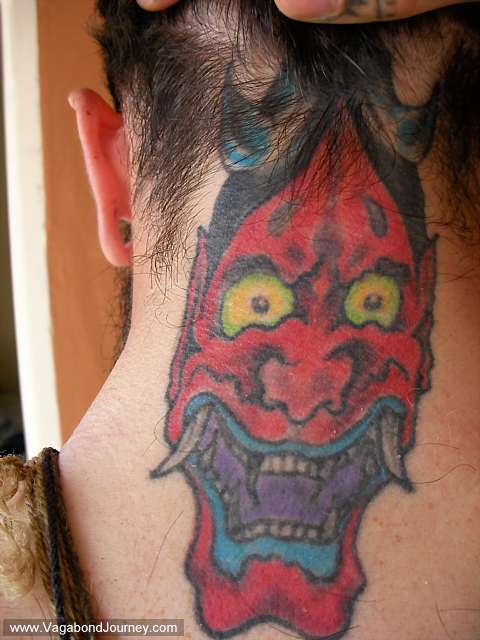 Japanese style neck tattoo of an Aka Oni from Japanese literature and 