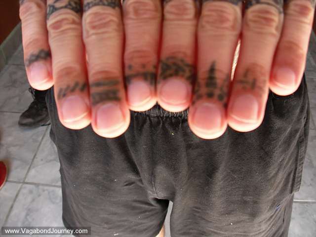 My finger tattoos were done by a train hopping hobo named Earl who had his 