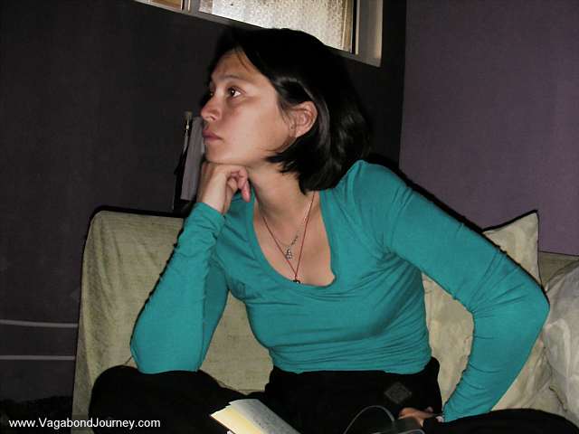 Odd looking French girl watching a movie at the Golden Gobi Guesthouse in 
