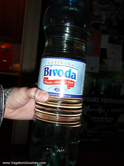 Homemade rakija or liquor in a water bottle in Belgrade
