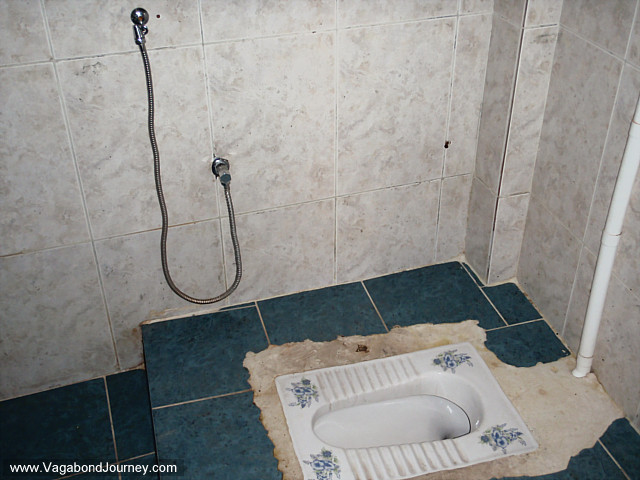 photo of a squatter toilet in iraq