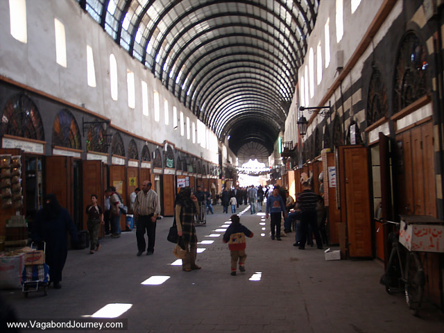 syrians shopping in a damascus souq