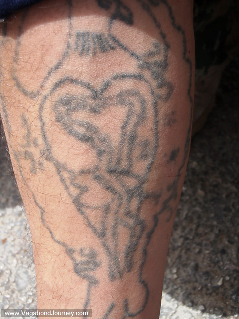 DIY tattoos of a heart ad Arabic writing,. bedouin tattoo of an eagle
