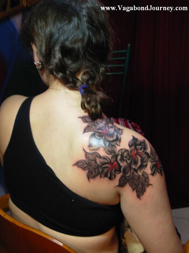 The above tattoo is of peony flowers that were done by the tattoo artist, 