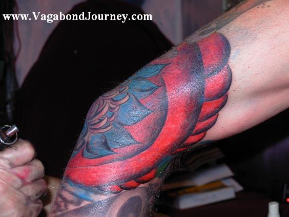 This is a tattoo of a lotus flower that was done in Hangzhou, 