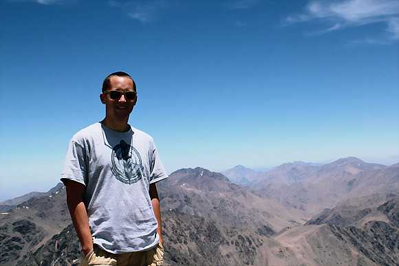 Pierre Laurent on the summit of Toubkal Mountain in Morocco