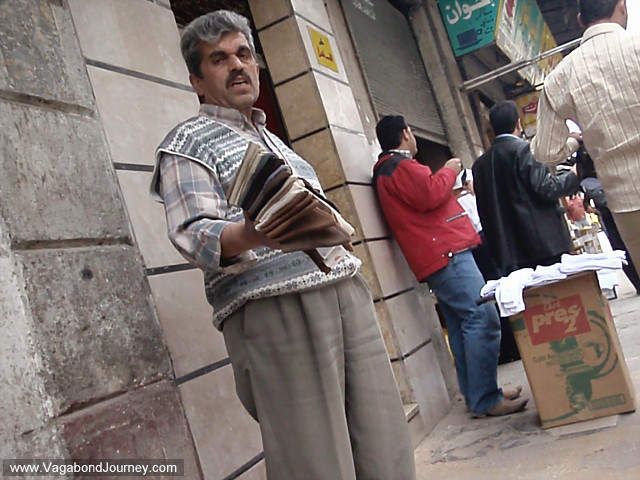 man selling socks on streets of aleppo