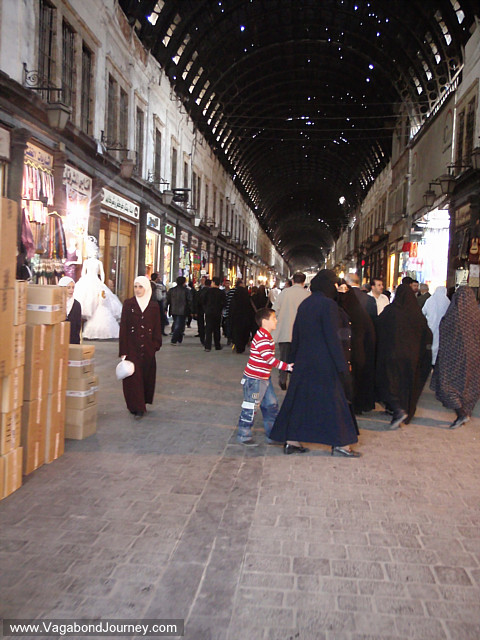 muslim women shop in market in syria