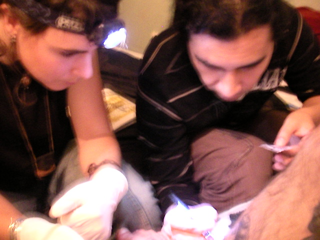 sergio villagran teaching mira to tattoo